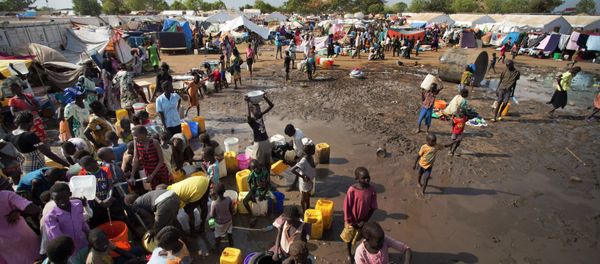 In this file photo of Sunday Dec. 29, 2013 file photo, displaced people gather around a water truck to fill containers at a United Nations compound which has become home to thousands of people displaced by the recent fighting, in the capital Juba, South Sudan In this file photo of Sunday Dec. 29, 2013 file photo, displaced people gather around a water truck to fill containers at a United Nations compound which has become home to thousands of people displaced by the recent fighting, in the capital Juba, South Sudan - Sputnik International