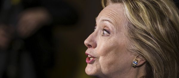 U.S. presidential candidate and former Secretary of State Hillary Clinton speaks with the media after sitting down with workers and management of Whitney Brothers children's toy and furniture factory during a round table while campaigning for the 2016 Democratic presidential nomination in Keene, New Hampshire April 20, 2015 U.S. presidential candidate and former Secretary of State Hillary Clinton speaks with the media after sitting down with workers and management of Whitney Brothers children's toy and furniture factory during a round table while campaigning for the 2016 Democratic presidential nomination in Keene, New Hampshire April 20, 2015 - Sputnik International
