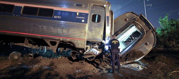 Emergency personnel work the scene of a deadly train wreck, Tuesday, May 12, 2015, in Philadelphia Emergency personnel work the scene of a deadly train wreck, Tuesday, May 12, 2015, in Philadelphia - Sputnik International