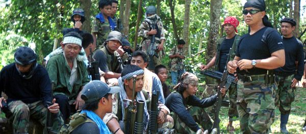 Abu Sayyaf spokesman Abu Sabaya, right foreground, is seen with his band of armed extremists in this undated photo - Sputnik International