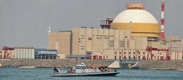 Indian coast guards ride on a boat near the Russian-built Kudankulam Atomic Power Project, background, during a protest at Kudankulam, about 700 kilometers (440 miles) south of Chennai, Tamil Nadu state, India Indian coast guards ride on a boat near the Russian-built Kudankulam Atomic Power Project, background, during a protest at Kudankulam, about 700 kilometers (440 miles) south of Chennai, Tamil Nadu state, India - Sputnik International