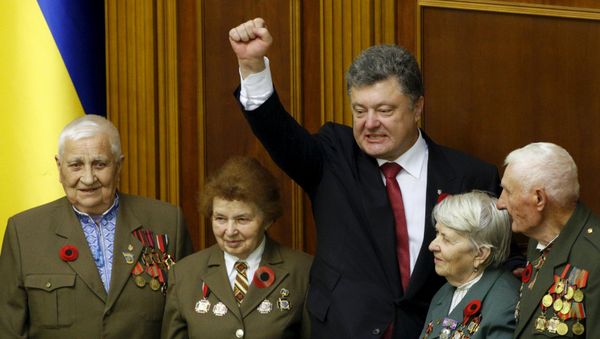 Ukrainian President Petro Poroshenko (center) gestures as he stands with veterans of the Ukrainian Insurgent Army (UPA) after a commemorative parliament session marking the 70th anniversary of the end of the war in Europe in Kiev, Ukraine May 8, 2015 Ukrainian President Petro Poroshenko (center) gestures as he stands with veterans of the Ukrainian Insurgent Army (UPA) after a commemorative parliament session marking the 70th anniversary of the end of the war in Europe in Kiev, Ukraine May 8, 2015 - Sputnik International