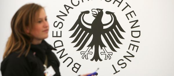 A guest walks past a logo of Germany's intelligence agency the Bundesnachrichtendienst (BND - Federal Intelligence Service) A guest walks past a logo of Germany's intelligence agency the Bundesnachrichtendienst (BND - Federal Intelligence Service) - Sputnik International