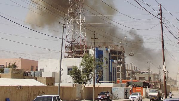 Smoke rises after a bomb attack in the city of Ramadi, May 15, 2015 - Sputnik International