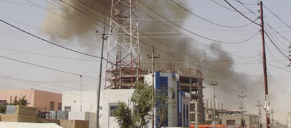 Smoke rises after a bomb attack in the city of Ramadi, May 15, 2015 Smoke rises after a bomb attack in the city of Ramadi, May 15, 2015 - Sputnik International
