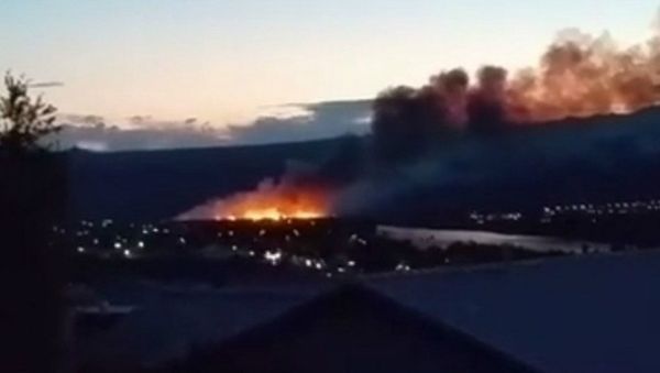 The growing fire is seen in a video posted on Facebook just after 8:00 p.m. May 17, 2015 - Sputnik International