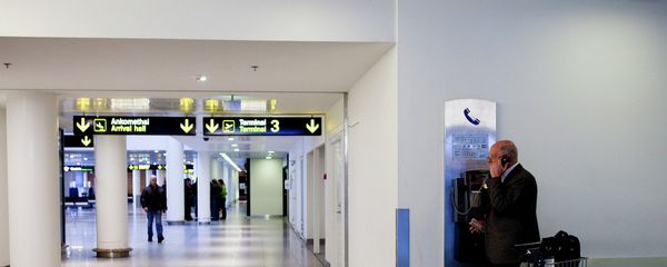 A man makes a phone call in Copenhagen International Airport in Kastrup A man makes a phone call in Copenhagen International Airport in Kastrup - Sputnik International
