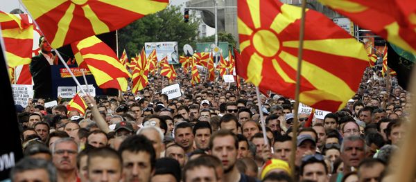 People wave national flags during a protest in front of the Government building in Skopje, Macedonia. People wave national flags during a protest in front of the Government building in Skopje, Macedonia. - Sputnik International