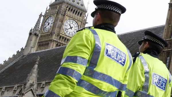 Police officers patrol past The Houses of Parliament in London. Police officers patrol past The Houses of Parliament in London. - Sputnik International