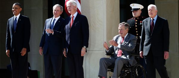 President Barack Obama stands with former presidents George W. Bush, Bill Clinton, George H.W. Bush, and Jimmy Carter. - Sputnik International