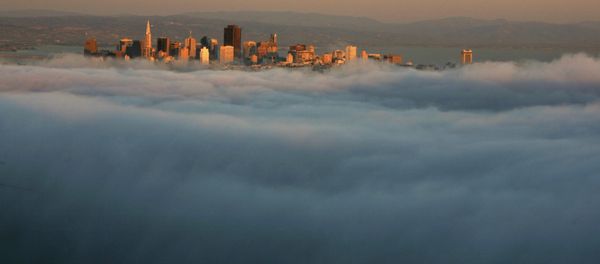The skyline of San Francisco appears above the evening fog as the suns sets on the Marin Headlands in Sausalito, California The skyline of San Francisco appears above the evening fog as the suns sets on the Marin Headlands in Sausalito, California - Sputnik International