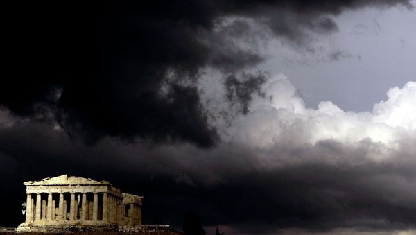 Dark clouds pass over a semi-sunlit Parthenon temple atop the ancient Acropolis Hill in Athens Dark clouds pass over a semi-sunlit Parthenon temple atop the ancient Acropolis Hill in Athens - Sputnik International