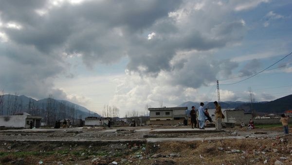 Pakistani children play at the demolished compound of Osama bin Laden in Abbottabad, Pakistan. - Sputnik International