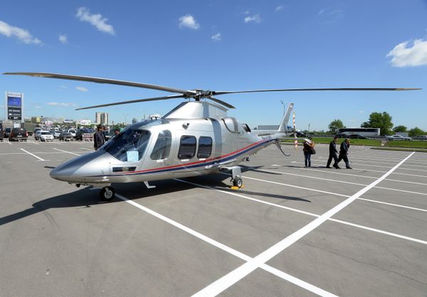 An Agusta AW109 helicopter by Moscow's Crocus Expo exhibition hall before the HeliRussia 2015 expo. An Agusta AW109 helicopter by Moscow's Crocus Expo exhibition hall before the HeliRussia 2015 expo. - Sputnik International