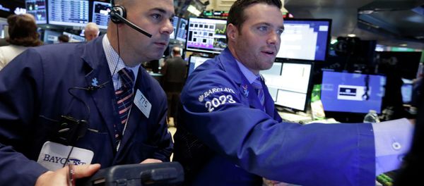 Trader Fred DeMarco, left, and specialist Frank Masiello work on the floor of the New York Stock Exchange Thursday, May 21, 2015 - Sputnik International