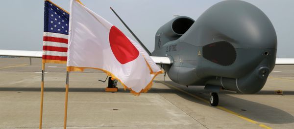 An advanced Global Hawk surveillance drone is displayed outside its hangar at Misawa Air Base in northern Japan Friday, May 30, 2014. An advanced Global Hawk surveillance drone is displayed outside its hangar at Misawa Air Base in northern Japan Friday, May 30, 2014. - Sputnik International