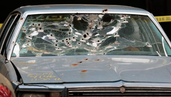 The car driven by Timothy Russell is shown Friday, April 10, 2015, in Cleveland. Cleveland police officer Michael Brelo, 31, was found not guilty of voluntary manslaughter in the November 2012 deaths of Russell, 43, and Malissa Williams, 30, after a high-speed chase. - Sputnik International