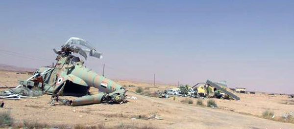 This picture released on Thursday, May 21, 2015 by the website of Islamic State militants, shows damaged Syrian military helicopters at Palmyra air base that was captured by the Islamic State militants after a battle with the Syrian government forces in Palmyra, Syria This picture released on Thursday, May 21, 2015 by the website of Islamic State militants, shows damaged Syrian military helicopters at Palmyra air base that was captured by the Islamic State militants after a battle with the Syrian government forces in Palmyra, Syria - Sputnik International