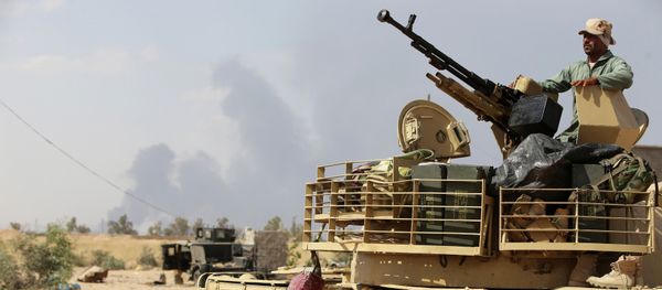 An Iraqi army member mans a tank on the outskirts of Baiji refinery north of Tikrit, during a joint operation between the army and popular mobilisation units to retake the remaining area of the Baiji oil refinery from Islamic State (IS) group jihadists, on May 24, 2015 An Iraqi army member mans a tank on the outskirts of Baiji refinery north of Tikrit, during a joint operation between the army and popular mobilisation units to retake the remaining area of the Baiji oil refinery from Islamic State (IS) group jihadists, on May 24, 2015 - Sputnik International