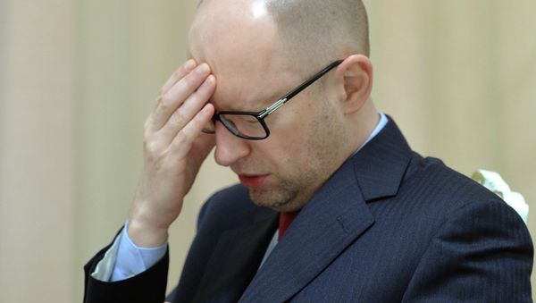 Ukrainian Prime Minister Arseniy Yatsenyk speaks during an interview for for French magazine le Nouvel Observateur in Kiev on January 20,2015 Ukrainian Prime Minister Arseniy Yatsenyk speaks during an interview for for French magazine le Nouvel Observateur in Kiev on January 20,2015 - Sputnik International