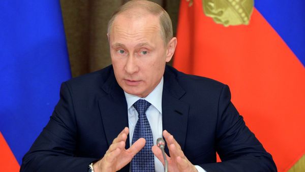 In this May 12, 2015 file photo, Russian President Vladimir Putin speaks at a meeting with representatives of top military brass and defense industries at the Bocharov Ruchei residence in the Black Sea resort of Sochi, Russia In this May 12, 2015 file photo, Russian President Vladimir Putin speaks at a meeting with representatives of top military brass and defense industries at the Bocharov Ruchei residence in the Black Sea resort of Sochi, Russia - Sputnik International