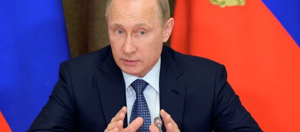 In this May 12, 2015 file photo, Russian President Vladimir Putin speaks at a meeting with representatives of top military brass and defense industries at the Bocharov Ruchei residence in the Black Sea resort of Sochi, Russia In this May 12, 2015 file photo, Russian President Vladimir Putin speaks at a meeting with representatives of top military brass and defense industries at the Bocharov Ruchei residence in the Black Sea resort of Sochi, Russia - Sputnik International
