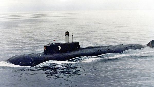 The Kursk, one of Russia's largest and most advanced submarines, which exploded and sank during naval maneuvers in August 2000, heaves ahead in the Barents Sea near Severomorsk in this 1999 file photo - Sputnik International