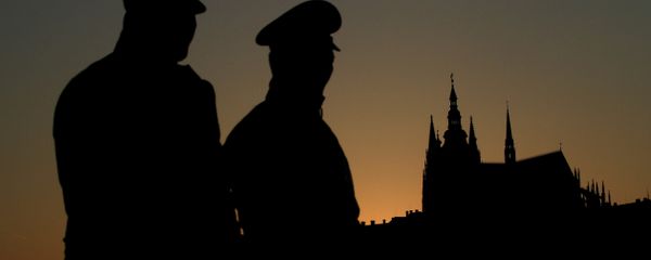 Czech policemen stand guard backdropped by Prague's castle Czech policemen stand guard backdropped by Prague's castle - Sputnik International