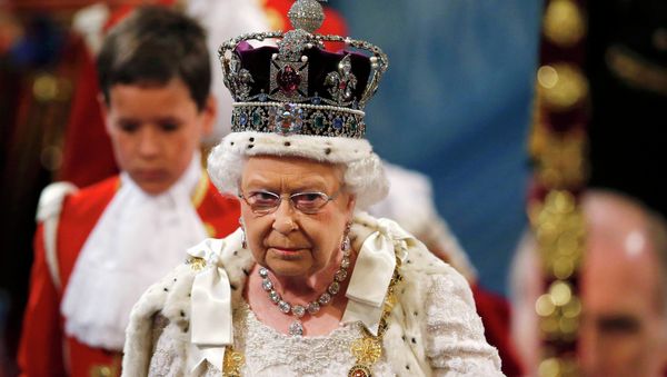Britain's Queen Elizabeth is accompanied by Prince Philip as they proceed through the Royal Gallery before the State Opening of Parliament in the House of Lords, at the Palace of Westminster in London Britain May 27, 2015 Britain's Queen Elizabeth is accompanied by Prince Philip as they proceed through the Royal Gallery before the State Opening of Parliament in the House of Lords, at the Palace of Westminster in London Britain May 27, 2015 - Sputnik International