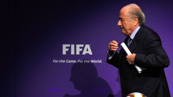 A picture taken on November 19, 2010 in Zurich shows FIFA president Sepp Blatter leaving a news conference following an executive committee meeting A picture taken on November 19, 2010 in Zurich shows FIFA president Sepp Blatter leaving a news conference following an executive committee meeting - Sputnik International