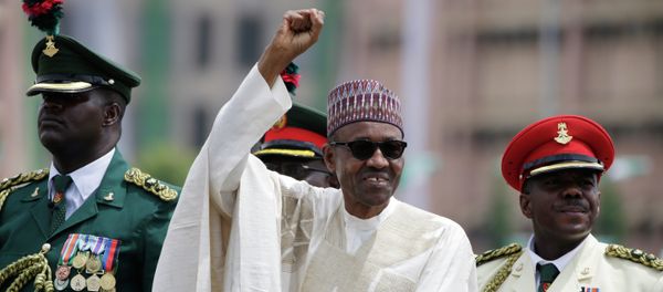 New Nigerian President, Muhammadu Buhari, salutes his supporters during his Inauguration in Abuja, Nigeria, Friday, May 29, 2015 - Sputnik International