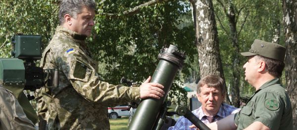 Petro Poroshenko visits First operational brigade of National Guard near Kiev Petro Poroshenko visits First operational brigade of National Guard near Kiev - Sputnik International