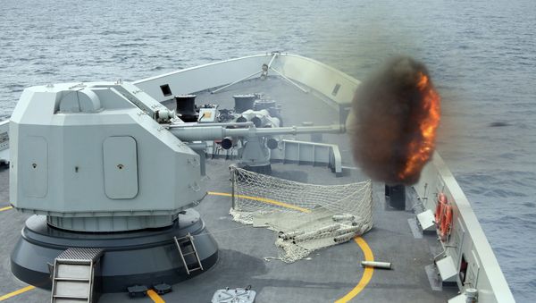 Anti-surface gunnery is fired from China's Navy missile frigate Yulin during the Exercise Maritime Cooperation 2015 by Singapore and Chinese navies in the South China Sea, May 24, 2015 Anti-surface gunnery is fired from China's Navy missile frigate Yulin during the Exercise Maritime Cooperation 2015 by Singapore and Chinese navies in the South China Sea, May 24, 2015 - Sputnik International
