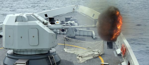 Anti-surface gunnery is fired from China's Navy missile frigate Yulin during the Exercise Maritime Cooperation 2015 by Singapore and Chinese navies in the South China Sea, May 24, 2015 Anti-surface gunnery is fired from China's Navy missile frigate Yulin during the Exercise Maritime Cooperation 2015 by Singapore and Chinese navies in the South China Sea, May 24, 2015 - Sputnik International