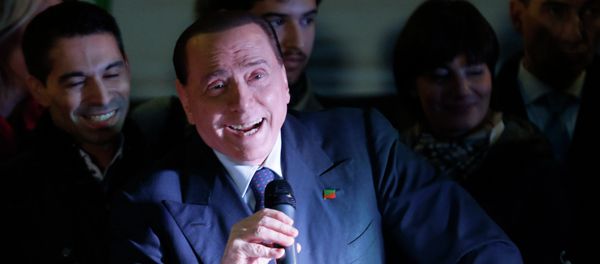 Former Italian Prime Minister Silvio Berlusconi accidentally showed up at a campaign rally for a local mayoral race, asked the name of the candidate, and encouraged people to vote for him, all before realizing that he had accidentally come out in support of his party's political opponent, Italian media have reported. Photo: Berlusconi speaking during a Forza Italia party rally in Milan. File photo. Former Italian Prime Minister Silvio Berlusconi accidentally showed up at a campaign rally for a local mayoral race, asked the name of the candidate, and encouraged people to vote for him, all before realizing that he had accidentally come out in support of his party's political opponent, Italian media have reported. Photo: Berlusconi speaking during a Forza Italia party rally in Milan. File photo. - Sputnik International