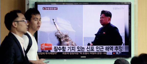 File Photo: South Korean men pass by a TV news program showing images published in North Korea's Rodong Sinmun newspaper of North Korea's ballistic missile believed to have been launched from underwater and North Korean leader Kim Jong-un, at Seoul Railway station in Seoul, South Korea, Saturday, May 9, 2015 File Photo: South Korean men pass by a TV news program showing images published in North Korea's Rodong Sinmun newspaper of North Korea's ballistic missile believed to have been launched from underwater and North Korean leader Kim Jong-un, at Seoul Railway station in Seoul, South Korea, Saturday, May 9, 2015 - Sputnik International