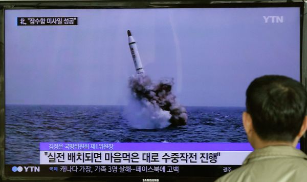 A South Korean man watches a TV news program showing an image published in North Korea's Rodong Sinmun newspaper of North Korea's ballistic missile believed to have been launched from underwater, at Seoul Railway station in Seoul, South Korea, Saturday, May 9, 2015 A South Korean man watches a TV news program showing an image published in North Korea's Rodong Sinmun newspaper of North Korea's ballistic missile believed to have been launched from underwater, at Seoul Railway station in Seoul, South Korea, Saturday, May 9, 2015 - Sputnik International
