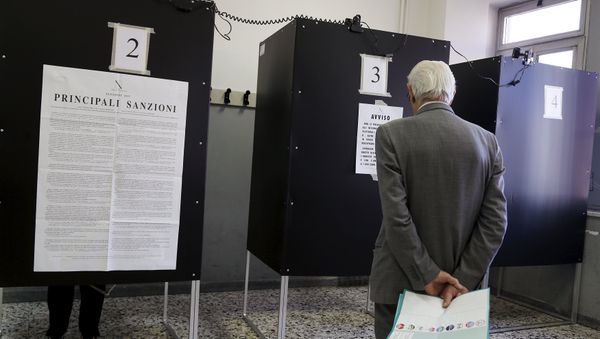 A man waits to enter a polling booth to cast his ballot at a polling station in Salerno, Italy May 31, 2015 A man waits to enter a polling booth to cast his ballot at a polling station in Salerno, Italy May 31, 2015 - Sputnik International