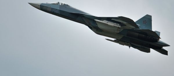 A T-50 airplane during demo flights at the Russian stage of the Aviadarts-2015 Flight Skills Competition in Voronezh A T-50 airplane during demo flights at the Russian stage of the Aviadarts-2015 Flight Skills Competition in Voronezh - Sputnik International