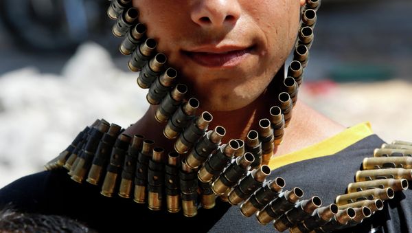 A bandolier of spent bullets A bandolier of spent bullets - Sputnik International