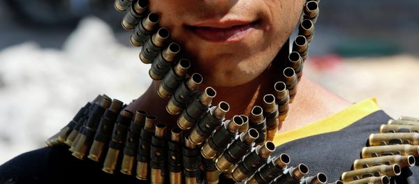 A bandolier of spent bullets A bandolier of spent bullets - Sputnik International