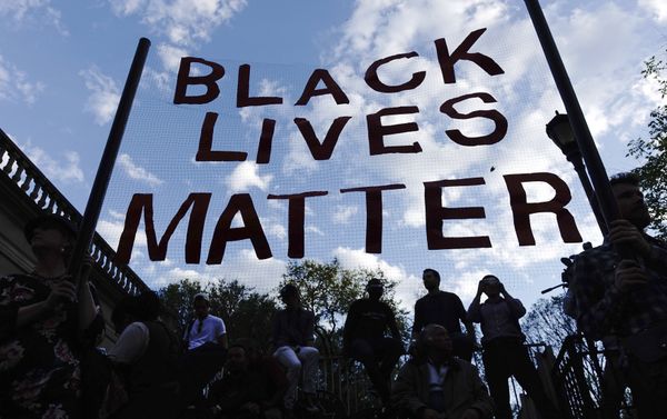 People take part in a rally on April 29, 2015 at Union Square in New York, held in solidarity with demonstrators in Baltimore, Maryland demanding justice for an African-American man who died of severe spinal injuries sustained in police custody - Sputnik International