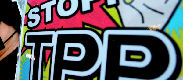 A placard during a rally against the Trans-Pacific Partnership (TPP) - Sputnik International