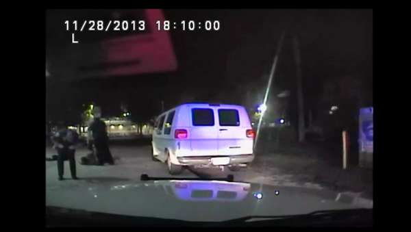 WATCH: Cops Accidentally Mace Each Other While Beating Handcuffed Man - Sputnik International