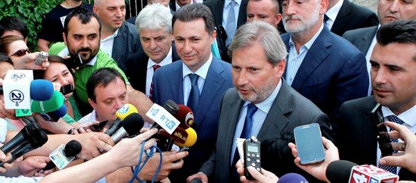 EU commissioner for Neighborhood Policy & Enlargement Negotiations Johannes Hahn, second from right, talks for the media EU commissioner for Neighborhood Policy & Enlargement Negotiations Johannes Hahn, second from right, talks for the media - Sputnik International