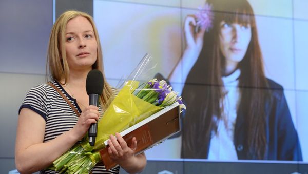 Winner of the Andrei Stenin International Press Photo Contest's Grand Prix Yelena Anosova at the award ceremony held at the Rossiya Segodnya International News Agency’s International Multimedia Press Center Winner of the Andrei Stenin International Press Photo Contest's Grand Prix Yelena Anosova at the award ceremony held at the Rossiya Segodnya International News Agency’s International Multimedia Press Center - Sputnik International