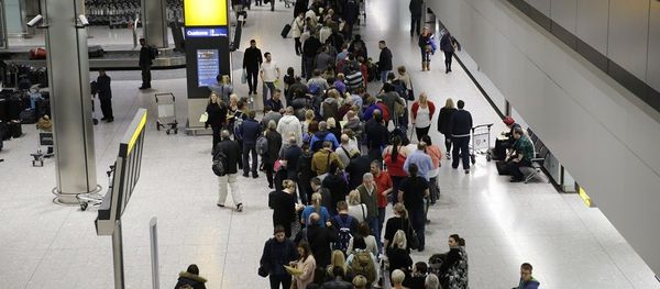 People queue in the luggage hall of Terminal 5 at Heathrow Airport in London. People queue in the luggage hall of Terminal 5 at Heathrow Airport in London. - Sputnik International