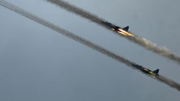 Su-25 jets during demo flights at the Russian stage of the Aviadarts-2015 Flight Skills Competition in Voronezh. - Sputnik International
