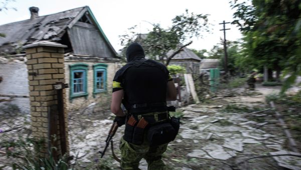 A Ukrainian serviceman A Ukrainian serviceman - Sputnik International