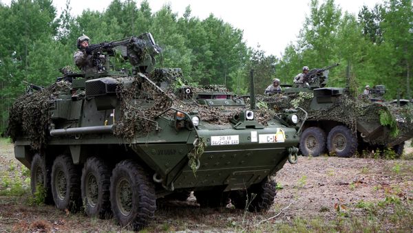 Soldiers from the US Pennsylvania National Guard take part in a field training exercise during the first phase Saber Strike 2014, at the Rukla military base, Lithuania, on June 14, 2014 Soldiers from the US Pennsylvania National Guard take part in a field training exercise during the first phase Saber Strike 2014, at the Rukla military base, Lithuania, on June 14, 2014 - Sputnik International